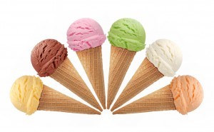 Six ice creams in cones on white background